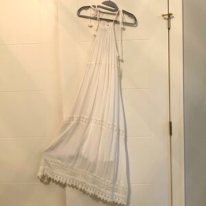 White sleeveless maxi dress, with ties at shoulders. Never worn, with tag.